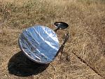 1 old direct TV dish + 1 roll of mylar + 1 roll of foil duct tape + northern california sun = easy cookin'
