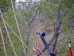 Me hunting in a tree sitting on ropes. More comfortable than any tree stand.