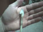 One of my small flint arrowheads on a willow shaft, inserted with pine pitch and wrapped with sinew.