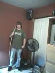 Me standing with my bow. It is 68 inches long.