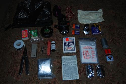 inner sanctum (detachable from car kit for unplanned hikes)
hurricane matches
waterproof matches
electrical tape
headlamp (incandescent w/ spare batteries)
led visor light w/ spare batteries
compass/whistle/thermometer
shower cap
30' 550 cord
20' 14ga. insulated wire
leatherman
magnesium firestarter
can opener
swiss army knife
iodine tablets
space bag
playing cards
survival cards
poncho
pen
candles (4 buddy burners, 4 tea lights)
5 minute epoxy
wire saw