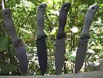 the three on the right are my new scrap yard scrapper 5's. very good mid size blade, handles are super comfortable.