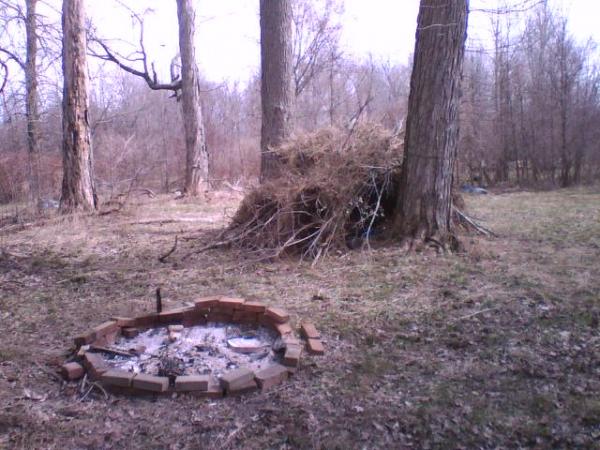 We built this natural tent on my buddies property using para-cord, and some brush and twigs and tree branches.